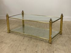 A gilt lacquered brass and glass two tier coffee table H54cm, 68cm x 130cm