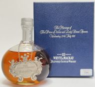 A bottle of Whyte & Mackay blended Scotch Whisky in box, issued for the marriage of Price Charles