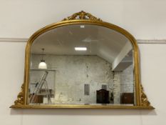 A Victorian style gilt framed over mantel mirror, with acanthus leaf surmount over conforming
