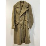 An Officer's WWII pattern officer's tunic and trouser, green wool overcoat, battledress and