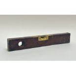 A 19thc brass mahogany spirit level (unmarked) (l- 46cm w-7cm)