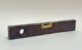 A 19thc brass mahogany spirit level (unmarked) (l- 46cm w-7cm)