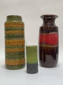 Two 1970's West German cylindrical ceramic vases, each by Scheurich, (H42cm) and an Austrian ceramic