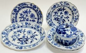 A mixed group of Meissen and Meissen style blue and white porcelain comprising four blue onion