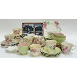 A mixed group of china comprising a green Crown Devon part tea-service comprising two cups, five