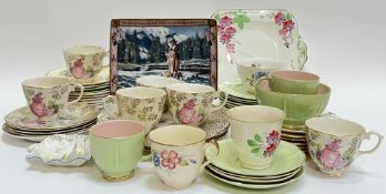 A mixed group of china comprising a green Crown Devon part tea-service comprising two cups, five