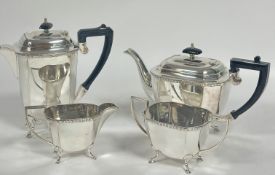 A four piece Epns tea and coffee set of tapered panel form raised on pad feet, (coffee pot H x