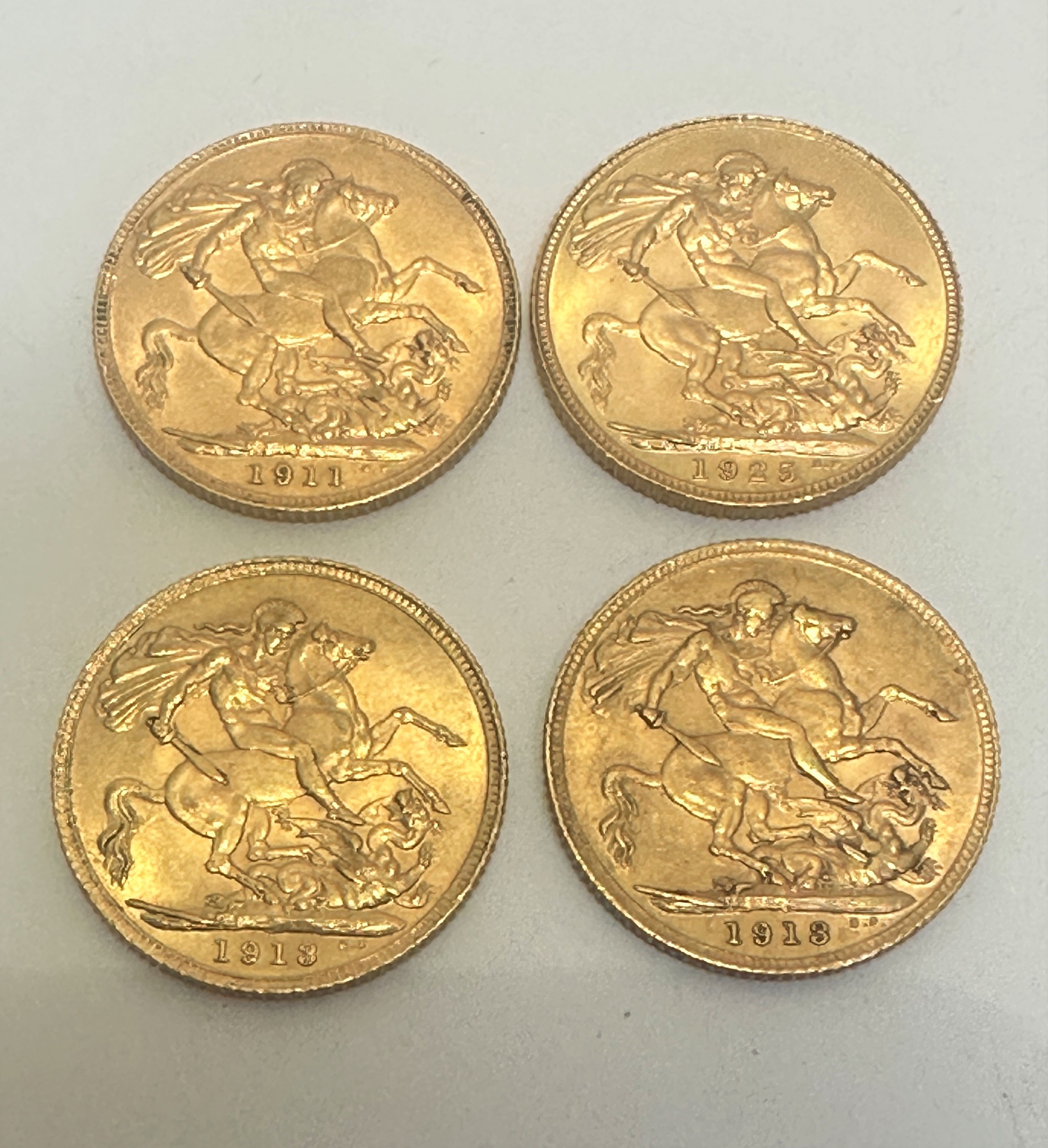 A four George V gold sovereigns dated, 1911, two 1913 and 1925, 32.09g (4) - Image 2 of 2