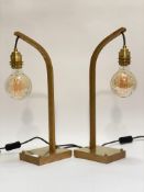 Tom Raffield, a pair of Wheal brass mounted oak table lamps, each with an Edison bulb on a bowed