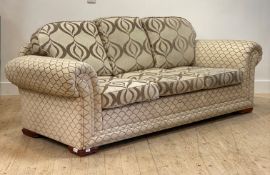 A traditional three seat sofa, in chenille type upholstery, moving on castors, H94cm, L228cm, D94cm