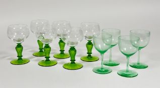 A set of six hock glasses with vine leaf etched decoration on baluster green footed stems (h-