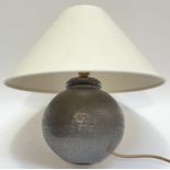 A metallic finish ceramic lamp and shade with stippled motif (height including shade- 35cm, w-