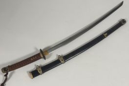 A Japanese samurai sword, bound handle with brass fittings and tsuba, plain polished steel blade (