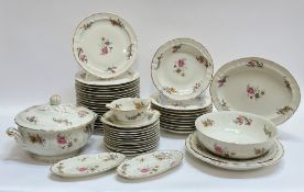 A large L.Bernardaud and Co Limoges pattern decorated with gilding and various floral displays and