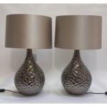 A pair of Contemporary metalic glazed ceramic table lamps of ovoid form, complete with cylindrical