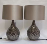 A pair of Contemporary metalic glazed ceramic table lamps of ovoid form, complete with cylindrical