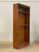 A mid 20th century walnut open bookcase, fitted with five shelves H194cm, W91cm, D32cm