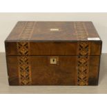 A Victorian walnut work box, the exterior with Tumbridge ware and mother of pearl inlay, opening