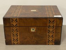 A Victorian walnut work box, the exterior with Tumbridge ware and mother of pearl inlay, opening