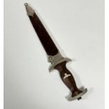 A WWII German SA dagger in original scabbard, chip and two cracks to wooden handle. R2. M7/66 1942