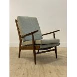 Scandart, A mid century teak open armchair, with upholstered squab cushions, raised on turned and