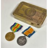 WWI British War and Victory medal pair, 54249 PTE J.SCOTT H.L.I. in a Princess Mary brass tin