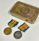 WWI British War and Victory medal pair, 54249 PTE J.SCOTT H.L.I. in a Princess Mary brass tin