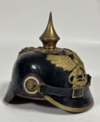 A good quality reproduction WWI German leather Picklehaub with Baden helmet plate with brass