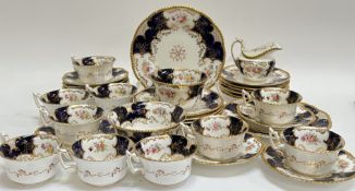 A 'Batwing' Coalport china tea/coffee service decorated with floral sprays in polychrome enamels and