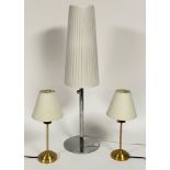 A contemporary chrome plated table lamp with white pleated shade (H86cm) together with a pair of