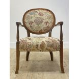 A walnut framed bedroom chair, fist half of the 20th century, the oval back and seat upholstered