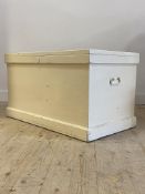 A 19th century painted pine blanket box, the interior fitted with candle box, carry handle to each