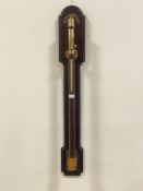 A reproduction ships style gimbal mounted mercury stick barometer, with brass plaques inscribed