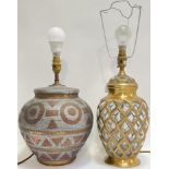 A globular ceramic lamp with abstract paper-resist decoration (height including bulb 44cm, w- 25cm),