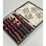 A set of six stag horn handled steak knives by Wilson and Sharp of Edinburgh with steel signed