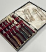 A set of six stag horn handled steak knives by Wilson and Sharp of Edinburgh with steel signed