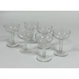 A set of six champagne coupes with thumb-cut hollowed stems on spreading foot. (h-12.5cm) (one