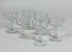 A set of six champagne coupes with thumb-cut hollowed stems on spreading foot. (h-12.5cm) (one