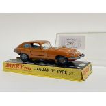 Dinky 131, a die cast model of Jaguar e-type, metallic bronze with pale blue interior, in a rigid