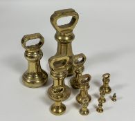 A selection of eleven Avery Ltd/ H.Pooley & Son Ltd brass weights varying from 14 pounds to 1/