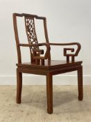 A Chinese Ming style hardwood side chair, with floral peirce carved splat back over panelled seat,