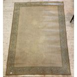 A modern Egyptian made ground rug, the jute herringbone ground enclosed by an embroidered border