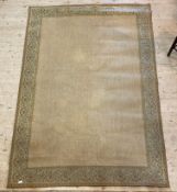 A modern Egyptian made ground rug, the jute herringbone ground enclosed by an embroidered border