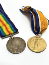 A pair of WWI general service medals, J Auld CZ 9528 O. TEL. R.N.V.R complete with ribbons. (2)
