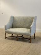 A cottage sofa of small proportions, circa 1920's, the square back and down swept arms well