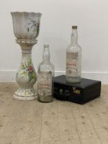 A large pair of decorative one gallon glass bottles, each baring paper label reading Dewar's fine