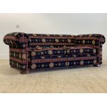 Duresta, a large two seat chesterfield sofa, upholstered in a chenille type fabric with sunburst