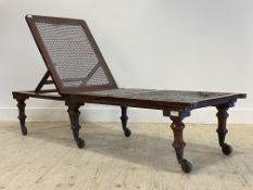 A late 19th century mahogany framed campaign day bed, with ivorine label inscribed Leveson,