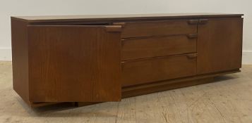 A mid century teak sideboard, fitted with three drawers flanked by a cupboard to each end (A/F) no