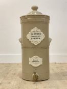 A 19th century glazed stoneware water filter by Defries of london, with white panels and roulette